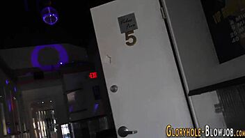 Redheaded whore sucks monster cock at gloryhole