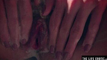 Dripping wet beauty enjoys soapy orgasms in the bathtub