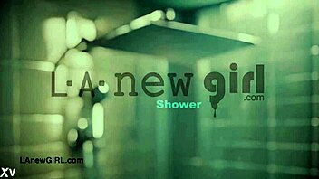 Stunning brunette model enjoys a relaxing shower in the bathroom