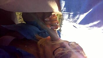 Milf gets fucked in the car, clothes ripped, ass shaking while licking cock outdoor