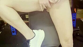 Beautiful MILF works out and uses toys in the gym.