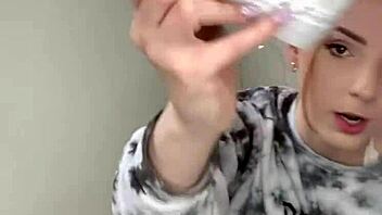 A Serbian girl removes her sneakers to reveal her bare feet.