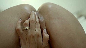 horny milf masturbates her wet trimmed pussy