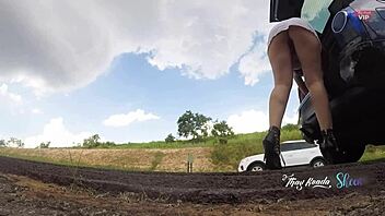 slut flashes in public by opening car trunk on highway