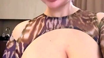 Spilling water on wet big natural tits in the kitchen