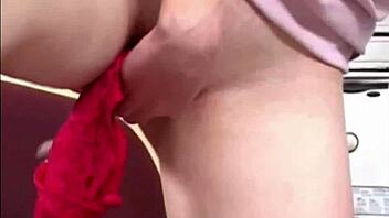 Blonde babe in wet lingerie steals panties for fetish fun.