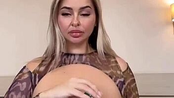 Spilling water on wet big natural tits in the kitchen