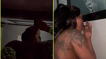 ebony amateur sucks strangers cocks at gloryhole