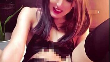 Japanese ladyboy masturbates in public toilet