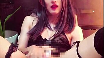 Japanese ladyboy masturbates in public toilet