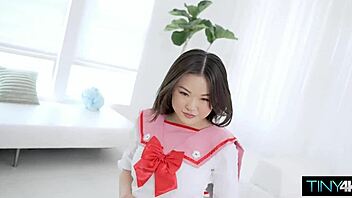 How does the tiny fuck doll handle that fat pole?