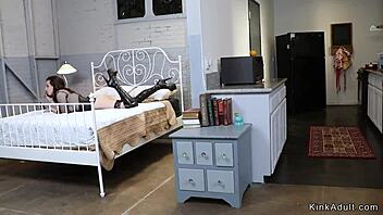 brunette lesbian fists stepmom's ass in bondage scene