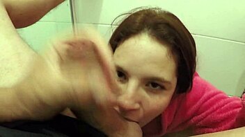 Novice girl loves sucking big cock hidden in bathroom! Her tight pussy gets attention too