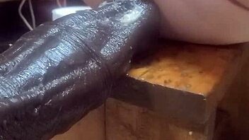 Huge dildos on fucking machine for intense anal assfucking in homemade setting.