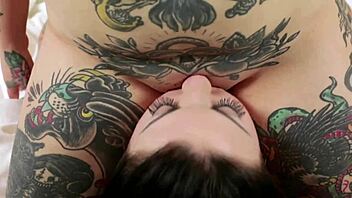 Beautiful tattooed lesbian licks shaved pussy