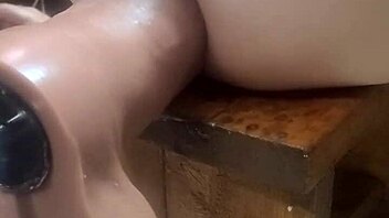 Huge dildos on fucking machine for intense anal assfucking in homemade setting.