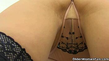 english milf kitty cream teases with a slow striptease