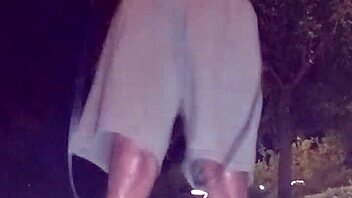 Athletic black guy picks up cute brunette for a workout session.