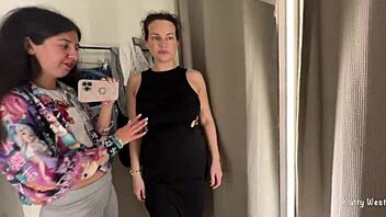 Two horny bitches are kissing in the public locker room with big tits