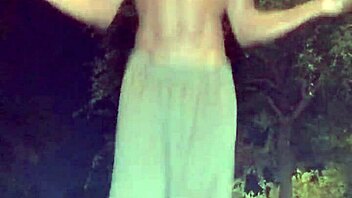 Athletic black guy picks up cute brunette for a workout session.