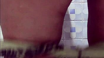 Madura gets captured flashing big ass and tits in public bathroom while riding cowgirl style