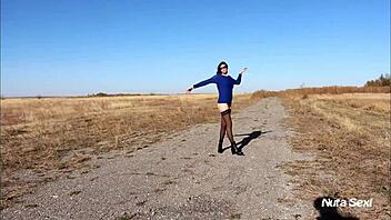 Leggy Brunette Shows Off Natural Tits and Body in Stockings Outdoors