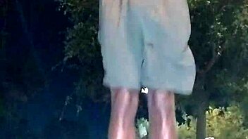 Athletic black guy picks up cute brunette for a workout session.