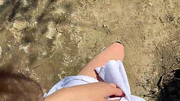 Young girl fishes in the forest after school.