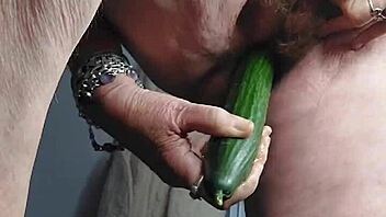 oma plays with cucumber in private scene