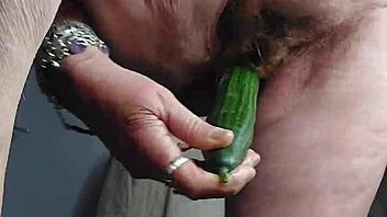 oma plays with cucumber in private scene