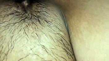 asian girl with wet pussy and tattoo in legs up position