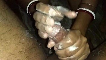 sexy indian wife strokes husband's cock to cum