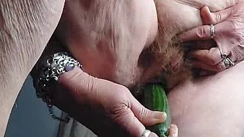 oma plays with cucumber in private scene
