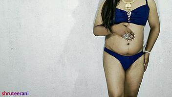 Watch Indian shemale in blue bikini crossdressing and fucking?
