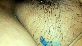 asian girl with wet pussy and tattoo in legs up position