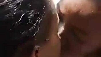 Two liberian lesbians kiss and lick in uncompleted building
