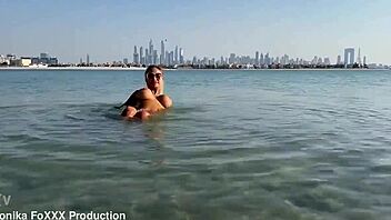 Monika Fox SWIMS NAKED in SEA and WALKS along BEACH