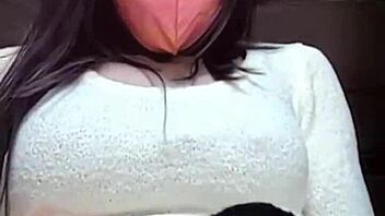 Masked Beautiful Woman In Crossdressing Masturbates While Streaming Live