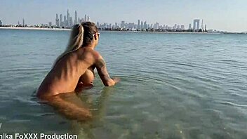 Monika Fox SWIMS NAKED in SEA and WALKS along BEACH