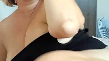 Blonde milf with big natural tits in shorts