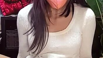 Masked Beautiful Woman In Crossdressing Masturbates While Streaming Live