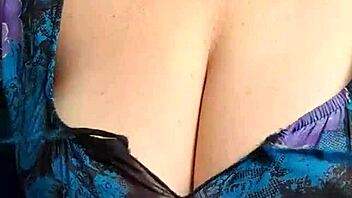 Blonde milf with big natural tits in shorts