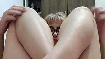 Blonde milf with big natural tits in shorts