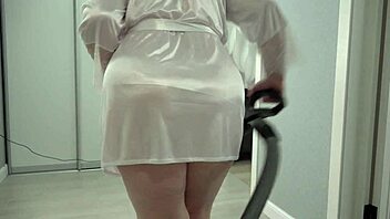 a home camera watches a mature housewife with a thick ass under a short robe and big boobs chubby milf behind the scenes pawg