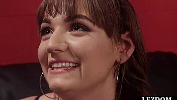 BDSM mistress uses dildo to fuck her lesbian protege