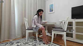 Kim Toy In Plaid Skirt And Nude Pantyhose Showing Her Toned Legs