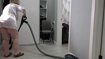 a home camera watches a mature housewife with a thick ass under a short robe and big boobs chubby milf behind the scenes pawg