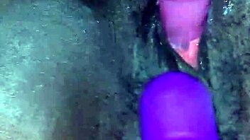 Ebony wife reaches creamy orgasm with toys in amateur video