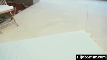 Girl in hijab learns about sex techniques.