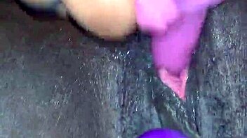 Ebony wife reaches creamy orgasm with toys in amateur video